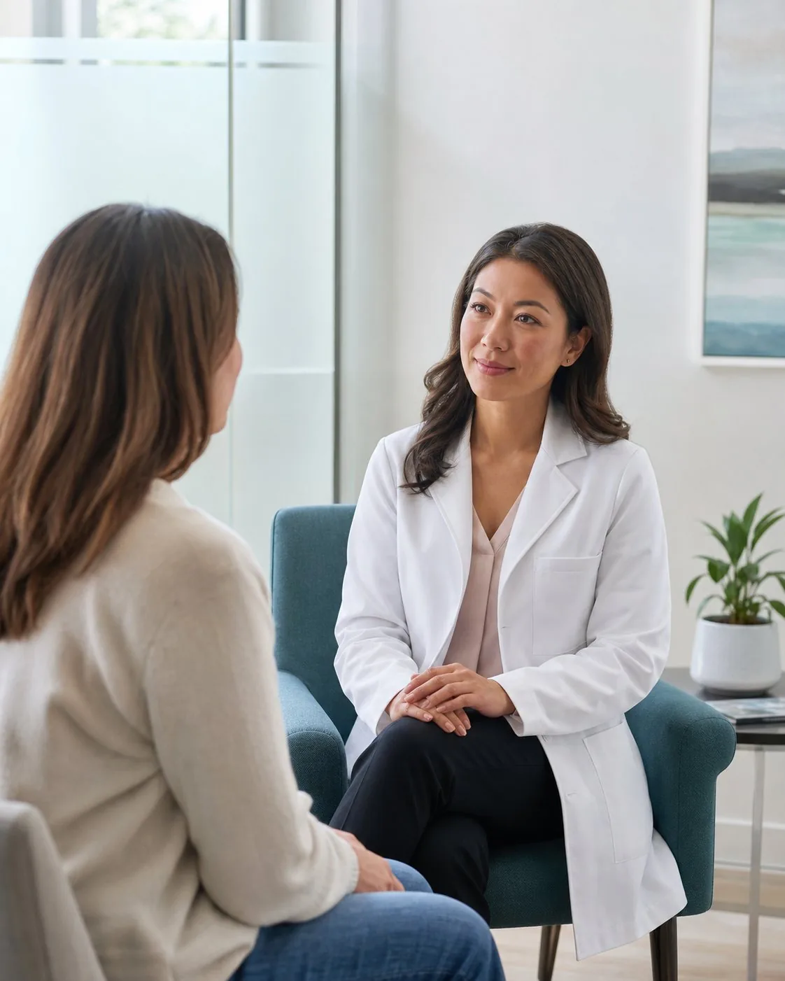A doctor having a calm, attentive conversation with a patient